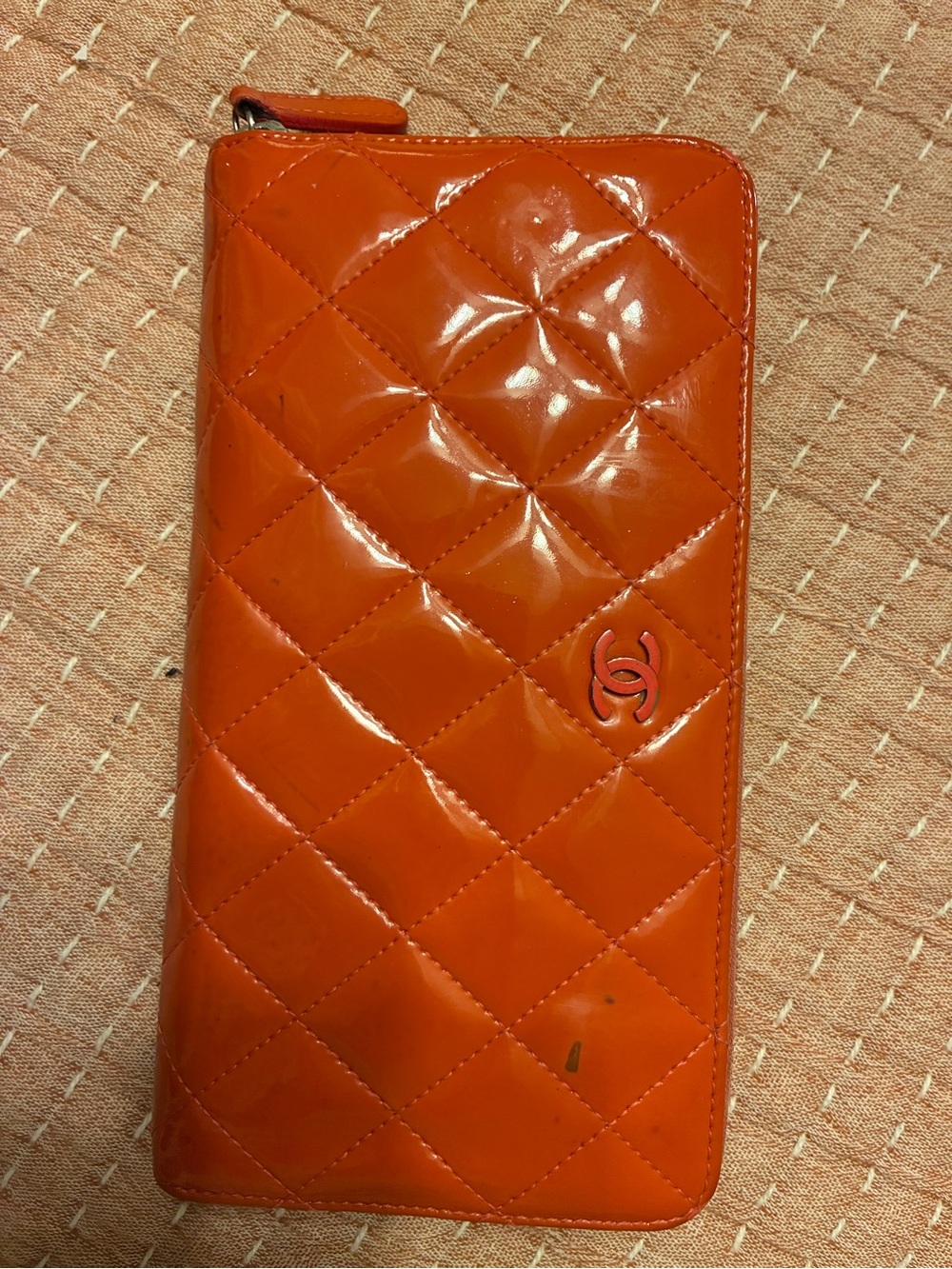 CHANEL Quilted Patent Leather Zip Wallet in Bright Orange